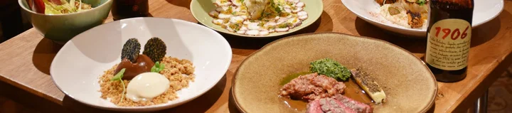 Dishes in table with 1906 beer